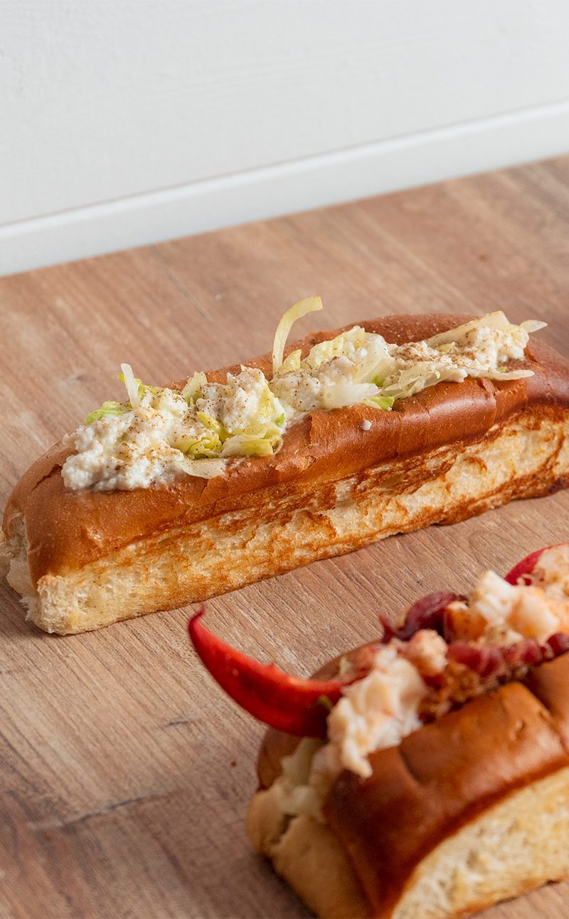 Three Mason's lobster rolls prepared for sharing